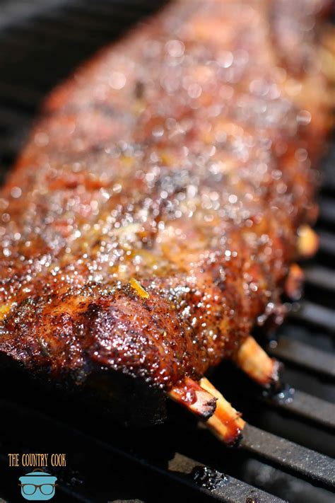 Grilling pork ribs. A rack of boneless pork spare ribs that weigh 3 ½ to 4 pounds need to be baked 1 ½ to 2 hours at 350 degrees Fahrenheit. The internal temperature should be 145 degrees after a thre... 