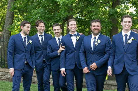 Groosmen. Two-piece groomsmen suits are a bit more casual and can be dressed down, even more so when the jacket is removed. In any case ,wedding suits should fit well and be pressed. Casual Attire. Photo Credit // Shutterstock. Vest, dress shirt, and slacks. A play on the two-piece suit, wearing a vest over a dress shirt is a great look for more informal ... 
