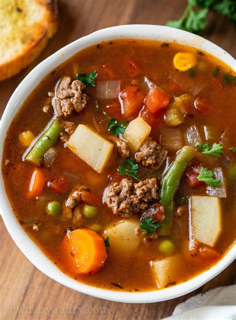 Ground beef vegetable soup. Allow to cook, uncovered, for about a half hour. Add potatoes. While the soup is cooking, soak cut the potatoes in a bowl of cold water. After the soup had been cooking for about 30 minutes, drain the potatoes and add them into the soup. Allow them to cook for about 45 minutes or until tender. 