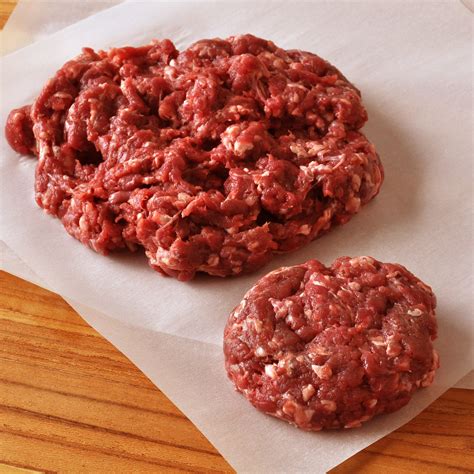 Ground venison. Using the slow cooker pan on the stove over medium heat, sauté the diced vegetables for 5 minutes. Add the ground meat to brown/cook for 15 minutes, drain and discard any grease. Optional step: While the meat is cooking, pour all of the diced tomatoes into a bowl. With a stick blender, puree the tomatoes slightly. 