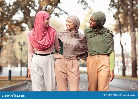 Group of Women Wearing Traditional Dress and Hijabs - Canva