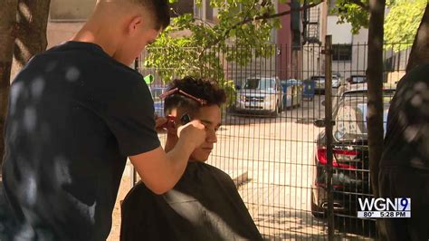 Group of migrants create pop up barber shop until work permits granted