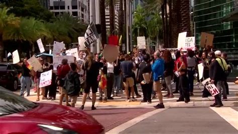 Groups across political spectrum protest DeSantis in Brickell ahead of presidential campaign launch