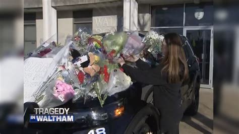 Growing memorial as community continues to mourn officer, worker killed in Waltham crash
