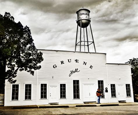 Gruene hall. The Gruene water tower stands over the town on a bluff above the Guadalupe River. Gruene Hall, built in 1878, is one of the oldest dance halls in Texas. Gruene General Store attracts tourists to the historical community. Gruene Mansion Inn and Bed and Breakfast. Gruene (/ ˈ ɡ r iː n / green) is a German-Texan town in Comal County in the U.S ... 