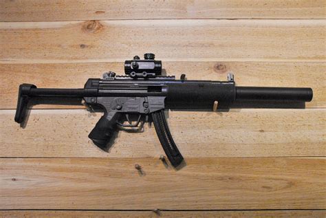 Gsg 522. Specifications. Caliber: .22lr. Barrel: 16.25″. weight: 6lbs (unloaded) Operation: Blowback. Finish: Matte Black. Capacity: Either 22 or 10 round magazine. Features. textured pistol grip. re-designed front sight. integrated weaver rail. wide magazine release paddle. integrated sling bracket. 