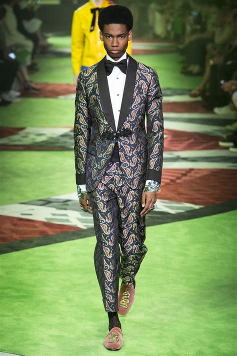 Gucci model. Models walk the runway of the Gucci Twinsburg Show during Milan Fashion Week Spring/Summer 2023 on September 23, 2022 in Milan, Italy. Roberto Gucci, Georgio Gucci and Maurizio Gucci at a new store of Gucci in Paris,France on September 22th,1983. 