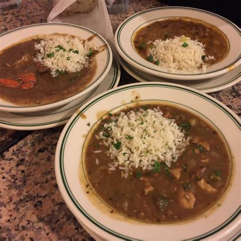 Gumbo shop new orleans. Make a dark roux (in a clean pan). Once it has the correct colour, add the onions, celery and green pepper, stir quickly. The mixture will be pretty hot, so make sure it doesn't burn here. Add garlic and leave to cook/bake for a little longer. Add the meats to the vegetables and roux and the stock or water. 