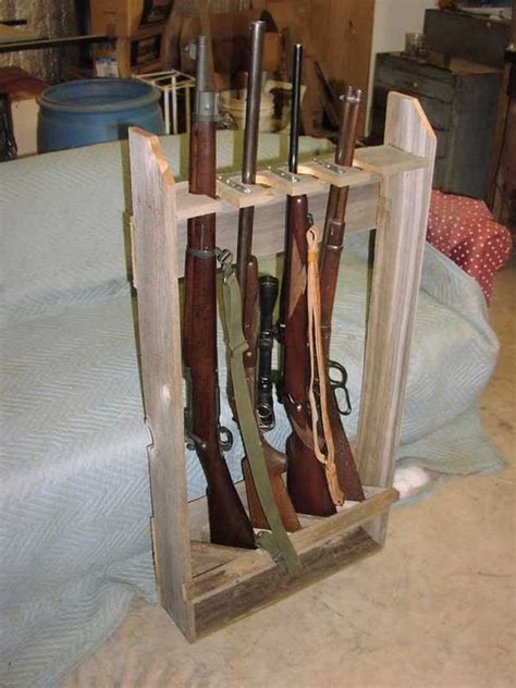 This oversized indoor 5 Rifle/Shotgun Wall Storage Display Rack is a great way to showcase and display your single barrel long guns or over/under shotguns (guns not included). This wall display gun rack will also accommodate tactical guns if the trigger guard and end of the muzzle measure 27 in. L. The Dark Walnut wood grain laminate adds ...