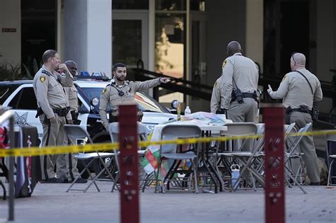 Gunman who killed 3 at UNLV did not appear to be targeting students, AP sources say