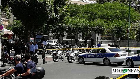Gunmen kill 11 people, injure several others in an attack on a police station in Iran, state TV says