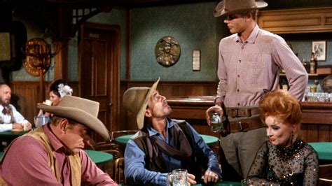 "Shooting Stopover" was the fifth episode of Season 6 of Gunsmoke, also the 200th overall episode of the series. Directed by Andrew V. McLaglen, the episode, prepared for television as a teleplay by John Meston from an original story written by Marian Clark, was originally broadcast on CBS-TV on October 8, 1960. Matt tries to bring a killer to Wichita on a stagecoach carrying a woman, a .... 