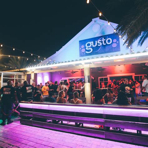 Gusto night club reviews. A great place to enjoy the sunset is this beach, one of the island’s best. Here are 13 of the top Aruba beach clubs: Reflexions Beach Club. Aruba Beach Club Resort. South Beach Club. Moomba Beach Club. Gusto Night Club Aruba. Brickell Bay Beach Club. Aruba Nautical Club. 