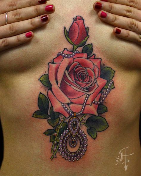 Gypsy rose tattoo. Gypsy Rose Tattoo: A rose combined with gypsy elements like a crystal ball or feathers, symbolizing free spirit. Forearm, Thigh: Rose Skeleton Hand Tattoo: A … 