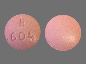 H 604 pill. Pink Pill 3605 V. Size: 14 mm. Shape: Oval. Color: Orange (Pillbox classifies it as an orange pill, though it is more of a peachy/light pink color) What It Is: Acetaminophen 325 mg, hydrocodone bitartrate 7.5 mg. What It’s For: Prescription opioid pain reliever for moderate to moderately severe pain. 
