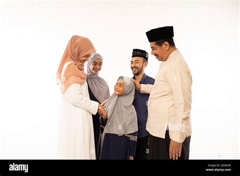 Happy Muslim Family Embracing After Performing Eid Prayer, Eid Mubarak ... - balustradellc