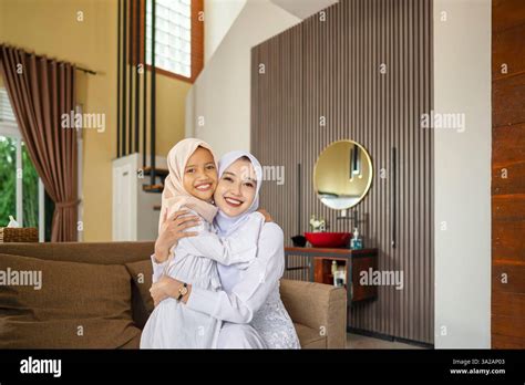 Happy Muslim Mother And Daughter Hugging For Eid Mubarak - balustradellc