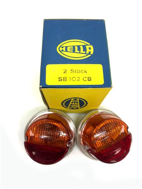 HELLA a pair of Hella tail lights, K23270, color: yellow/red