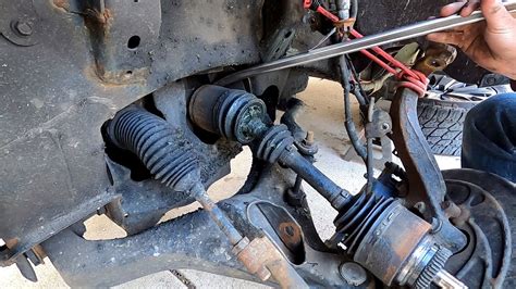 HOW DO I REMOVE A FRONT END AXLE ON A 2005 …