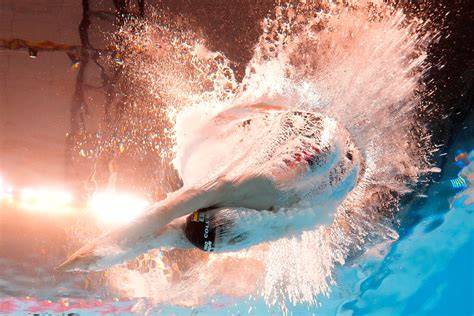 How this AP photographer captured a unique splash at the swimming ... - raincitystudios.com