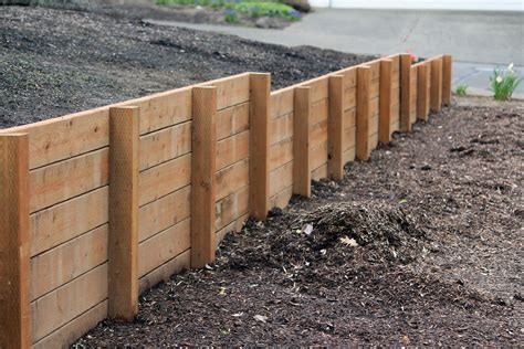 How to build a wood retaining wall on a slop - balustradellc