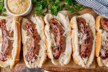 How to Cook Brats in the Oven for Crispy Skin - Tastes of Lizzy T - balustradellc