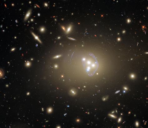 Hubble Spots Gravitationally-Lensing Galaxy Cluster - muktibox.com