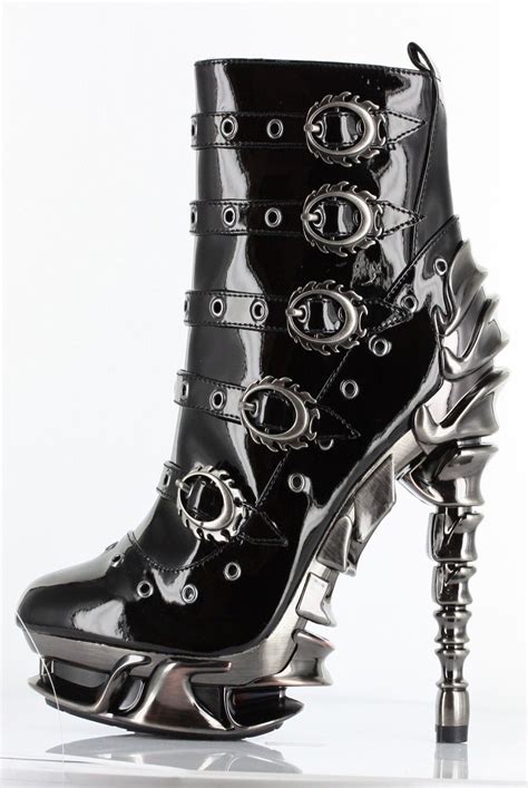Hades shoes. Dangerously hot best describes the Zetta, the newest addition to Hades signature spinal heel collection. This pump is decorated all around with silver, lightweight gunmetal spikes … 