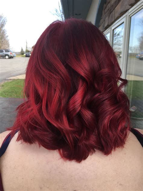 Hair colour red violet. 