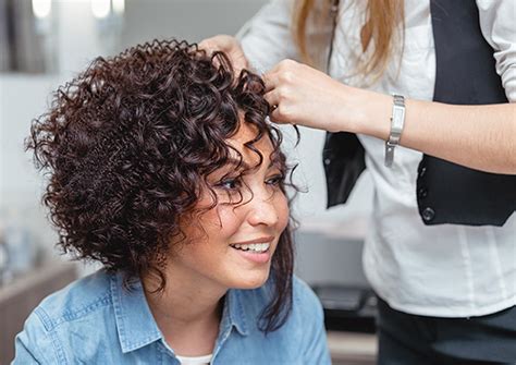 Hair salons perms. The first is a cold wave perm, also called an alkaline perm. Cold wave is a faster process that uses ammonium thioglycolate to set your perm within about 15 minutes. The second type, an acid ... 