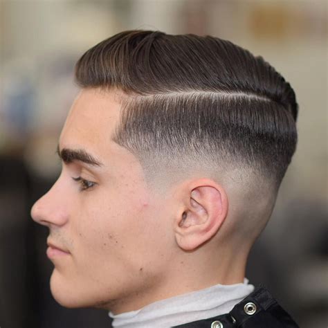 Haircuts for men medium fade. Mar 1, 2023 · The most popular haircuts for men are the fade, undercut, comb over, quiff, crew cut, French crop, slick back, buzz cut, faux hawk, side part and modern mohawk. These trending men’s hairstyles offer stylish looks that work with different lengths and textures to create a cool and modern look. Whether you want short, medium or long hair, the ... 