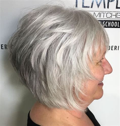 Trendy hairstyles for women over 60 with very thin hair create a fuller look by adding lift and volume. The secret lies in its strong perimeter with minimal layering. It makes fine hair look strong and leaves weight for added volume. Alena Gale, a salon owner from Charleston, SC, shares her thoughts on this cut.. 