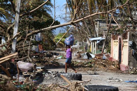 NPR's Scott Simon speaks to Miami Herald Caribbean Correspondent Jacqueline Charles about the horrific uptick of violence in Haiti, where vigilantes and gangs are engaged in deadly clashes.. 