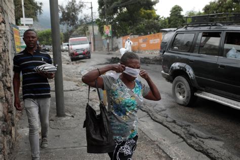 Haitian neighborhood exacts fiery revenge on gang members