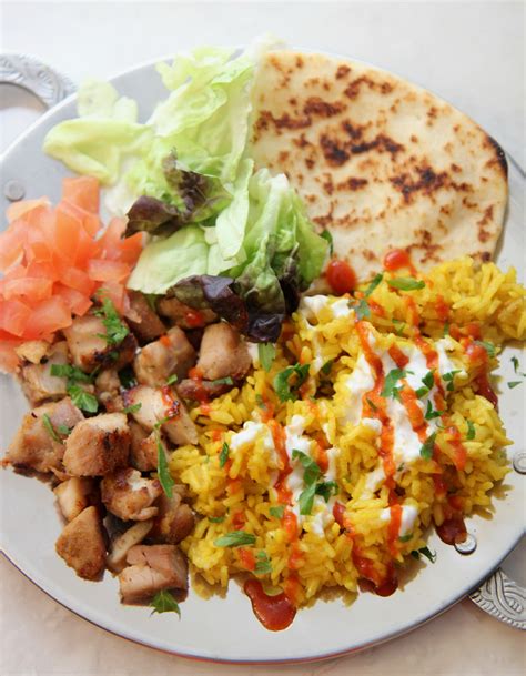 Halal chicken and rice. One of my favorite dishes all time. The flavor of this dish is to die for! Don't forget to drop a like and subscribe so I can love you forever.2 pounds chick... 