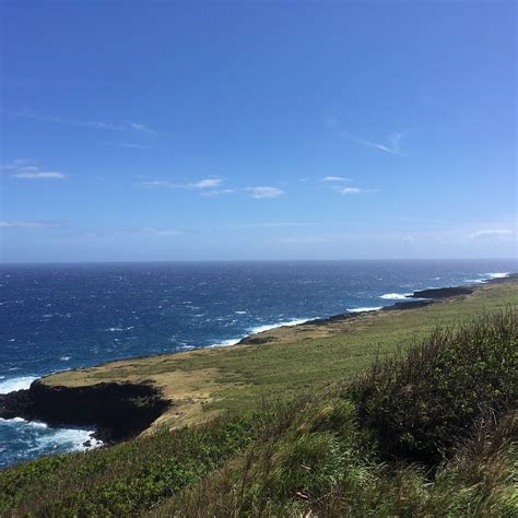 southern coast of hawaii at haleokane lookout and pacific ocean on horizon. 