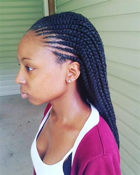 A half-cornrow, half-braid updo gives the appearance of enormous buns with elaborate braids. Try this classy and striking hairstyle if you're looking for a glamorous and chic cornrow braid look. If you anticipate having more opportunities to impress outside, this cornrow braided bun is also appropriate for special occasions.