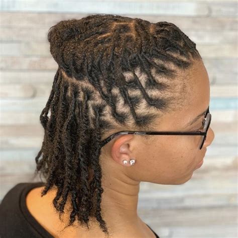 13 of 13. Half-Up Bun. Twist your locs into a half-up bun and leave a few pieces out in the back and front to create a goddess-like style like Teyana Taylor's. Loc Updos, Braids, And Twists For .... 