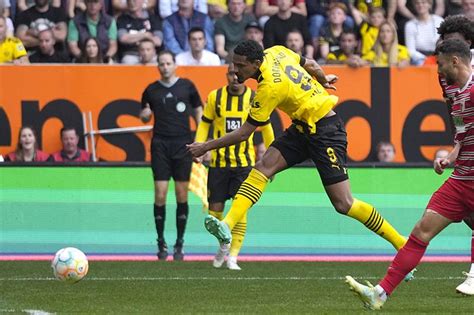 Haller fires Dortmund to the top of the Bundesliga, just 1 round left
