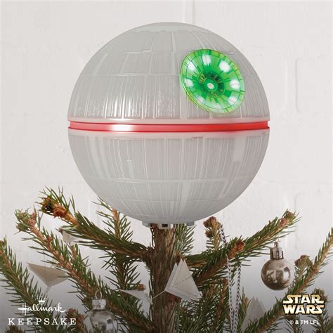 Hallmark death star tree topper. Connect all of the "Star Wars: A New Hope" Storytellers ornaments—Luke Skywalker, Obi-Wan Kenobi, C-3PO and R2-D2—and the Death Star Tree Topper (each sold separately) to unlock additional amazingly interactive 