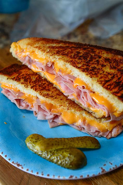 Ham and cheese. Instructions · Take the raw biscuit dough and pull it in half. · Fold the lunch meat to fit inside the dough. · Place the lunch meat and then a slice of cheese... 