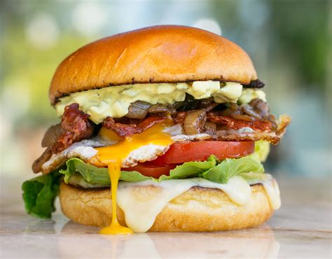 Hamburger with egg. Mar 1, 2024 ... A burger with an egg on top can be called various names, including a “breakfast burger,” “egg burger,” “sunrise burger,” or simply a “burger ... 