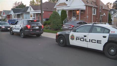 Hamilton police investigating double homicide; suspect barricaded in home