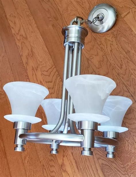 Hampton bay 445994. Hampton Bay Chandelier 445994. Good condition, works perfect! Only selling because room was switched for gaming area. $25 for quick sale! 