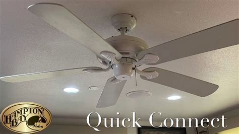 Hampton bay quick connect ceiling fan. Traditional styling and a quiet motor make the Hampton Bay Rockport ceiling fan a great way to add comfort and style to any room. Installation is quick and easy, with a slide-on mounting bracket, QuickInstall blades and the ability to mount on flat or angled ceilings. There is a 3-light kit with 9.5-Watt LED bulbs for energy efficiency. It is compatible with extension downrods for high ceilings. 