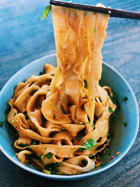 Handpulled noodles. Make the dough with a food processor: Be sure to use the dough blade attachment in your food processor. Pour ¾ cup water into the bowl, then add the salt, oil, and flour. Process for about 1 to 2 minutes until the dough forms into a ball. Transfer the dough into a plastic bag and knead for another minute through … 