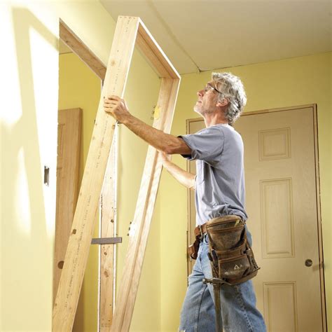Hang a door. Make sure the door opens in the right direction before securing it to the wall. 2. Screw the top and bottom hinges into the doorframe. Use an electric screwdriver to connect the top screws of the top and bottom hinges. Put the bottom screw in the top hinge to help support the weight of the door. 