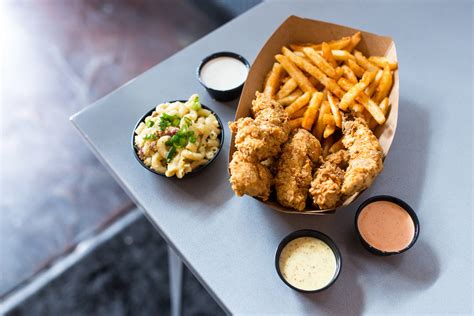 Happy chicks. Happy Chicks is a chicken joint that offers Texas-sized chicken tenders made fresh to order with scratch made sides. You can order online, find a location near you, or see their Instagram posts for more information. 