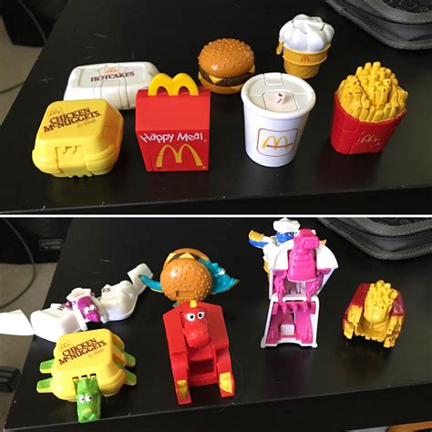 Happy meal toy. A Happy Meal is a kids' meal usually sold at the American fast food restaurant chain McDonald's since June 1979. [1] A small toy or book is included with the food, both of which are usually contained in a red cardboard box with a yellow smiley face and the McDonald's logo. The packaging and toy are frequently part of a marketing tie-in to an ... 