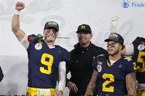 Harbaugh’s Michigan Wolverines to play for national title after stopping Alabama 27-20 in OT